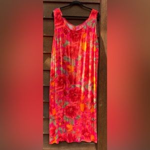 Bright color dress . Cut straight , simple style but the colors are like Hawaii.